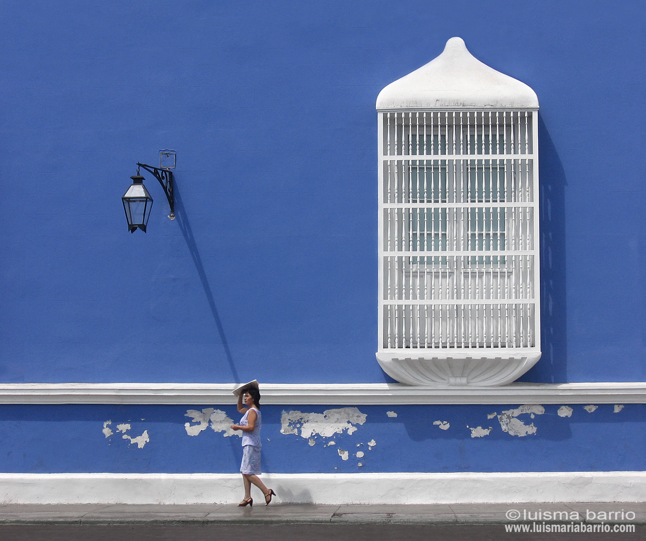 blue colonial building trujillo peru